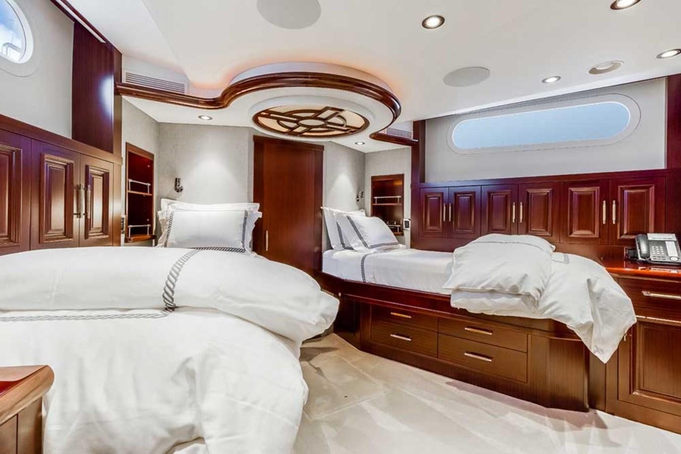 a room with several beds aboard OUR HERITAGE Yacht for Sale