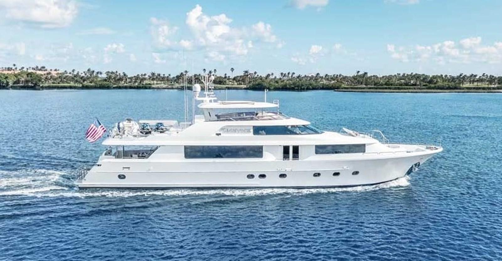 a white yacht in the water aboard OUR HERITAGE Yacht for Sale