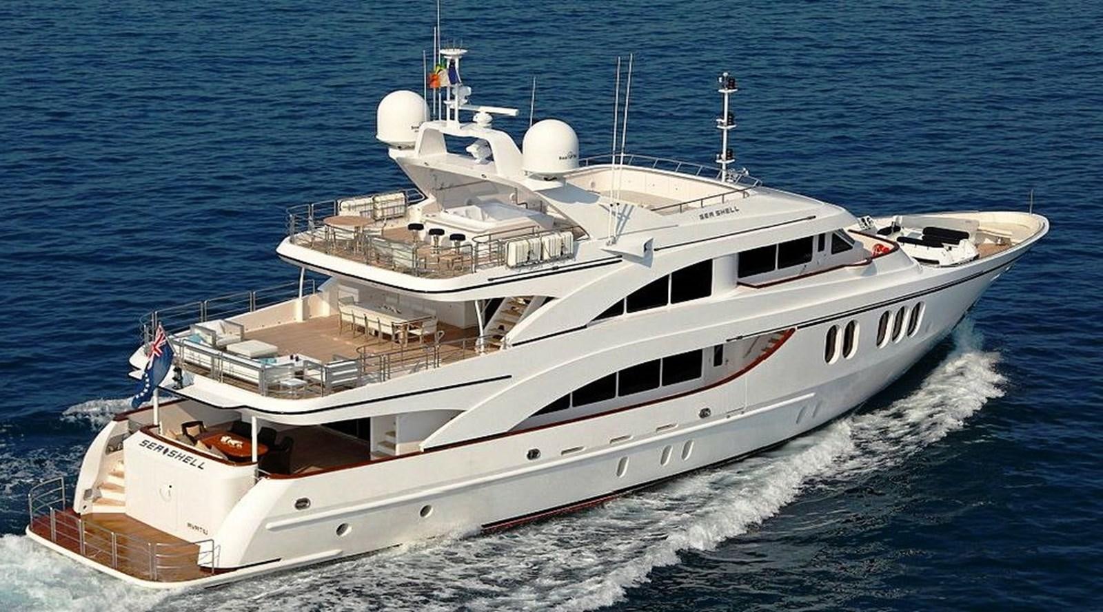 a large white boat in the water aboard SEA SHELL Yacht for Sale
