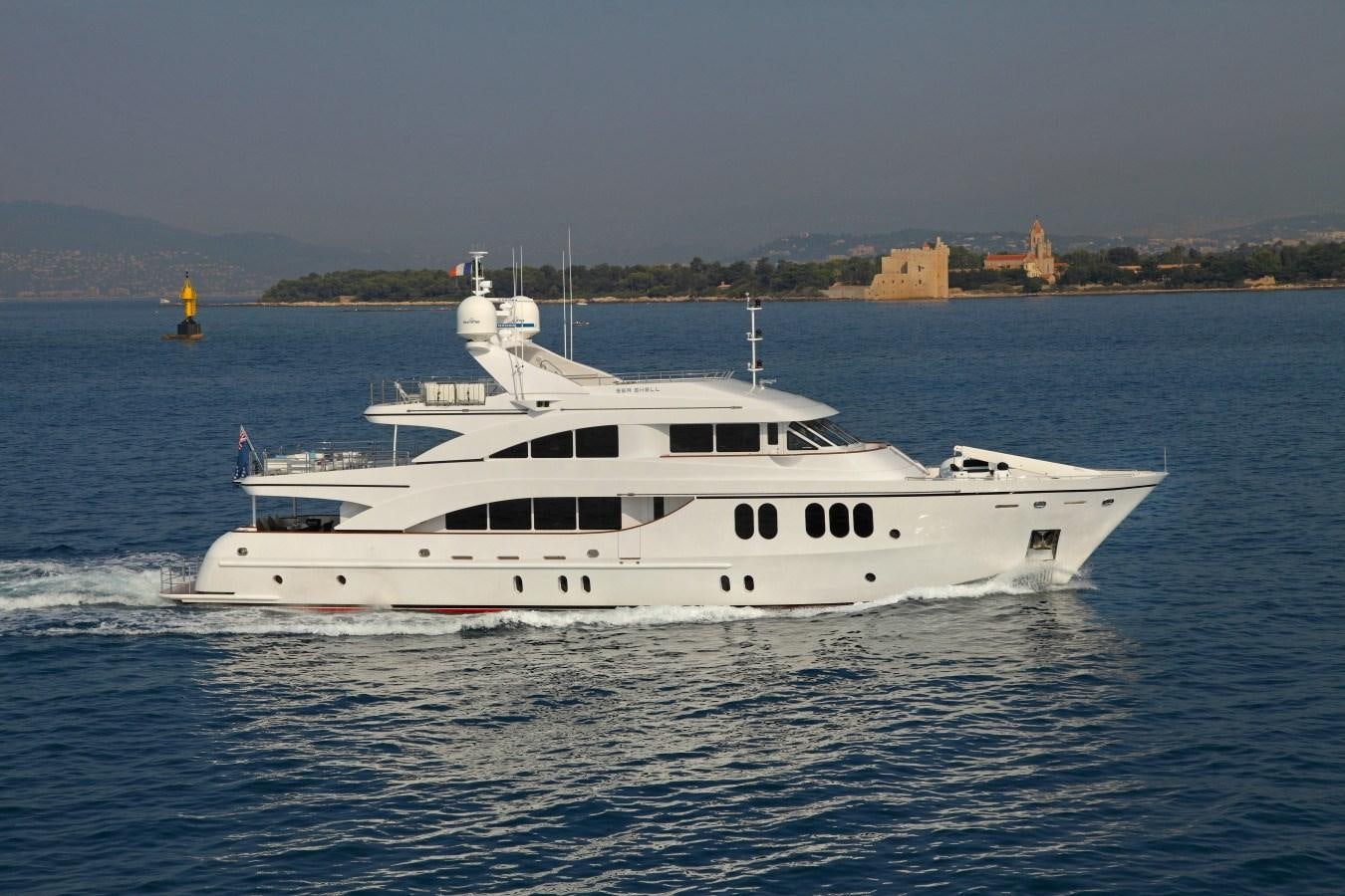 a white yacht on the water aboard SEA SHELL Yacht for Sale