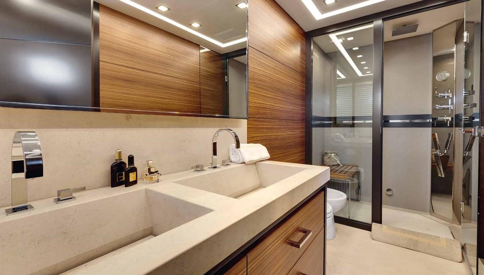a bathroom with a sink and a shower unit aboard AXTANA Yacht for Sale