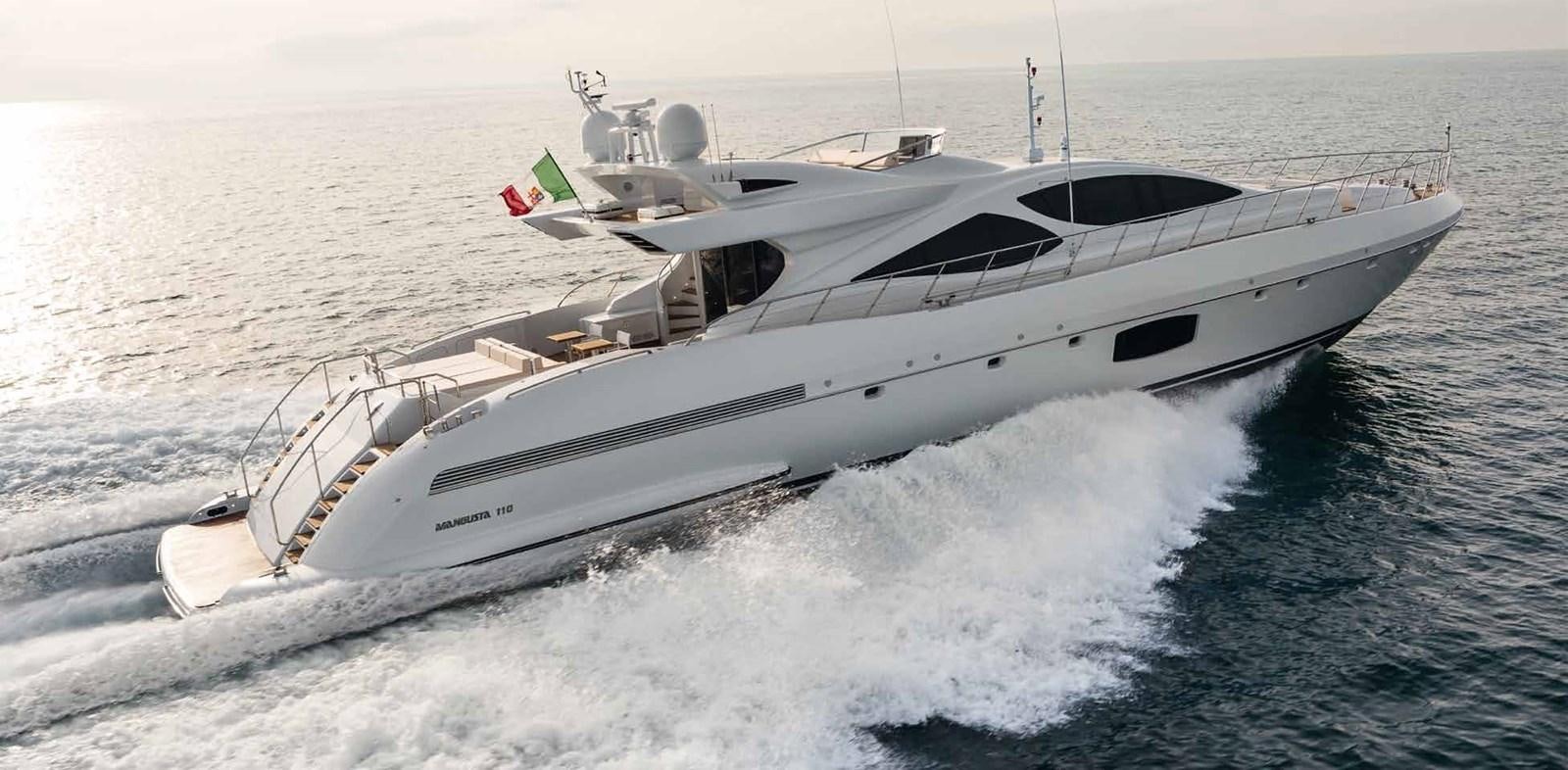 a white yacht on the water aboard AXTANA Yacht for Sale