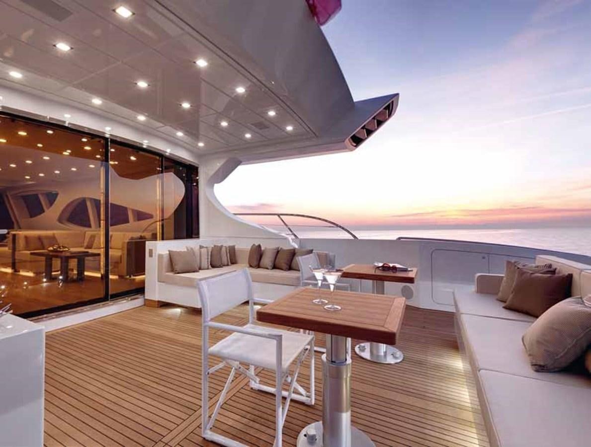 a living room with a large window aboard AXTANA Yacht for Sale