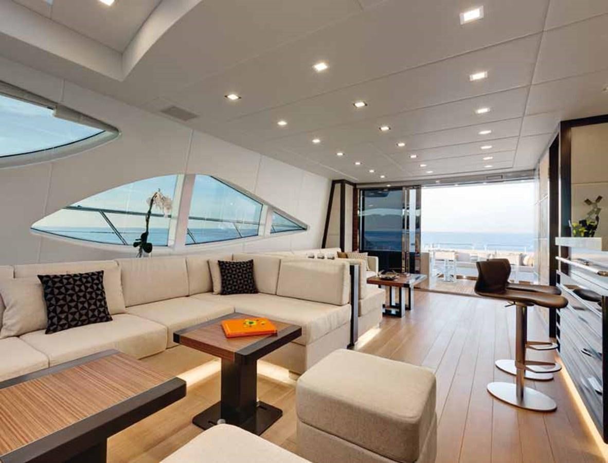 a living room with a large window aboard AXTANA Yacht for Sale
