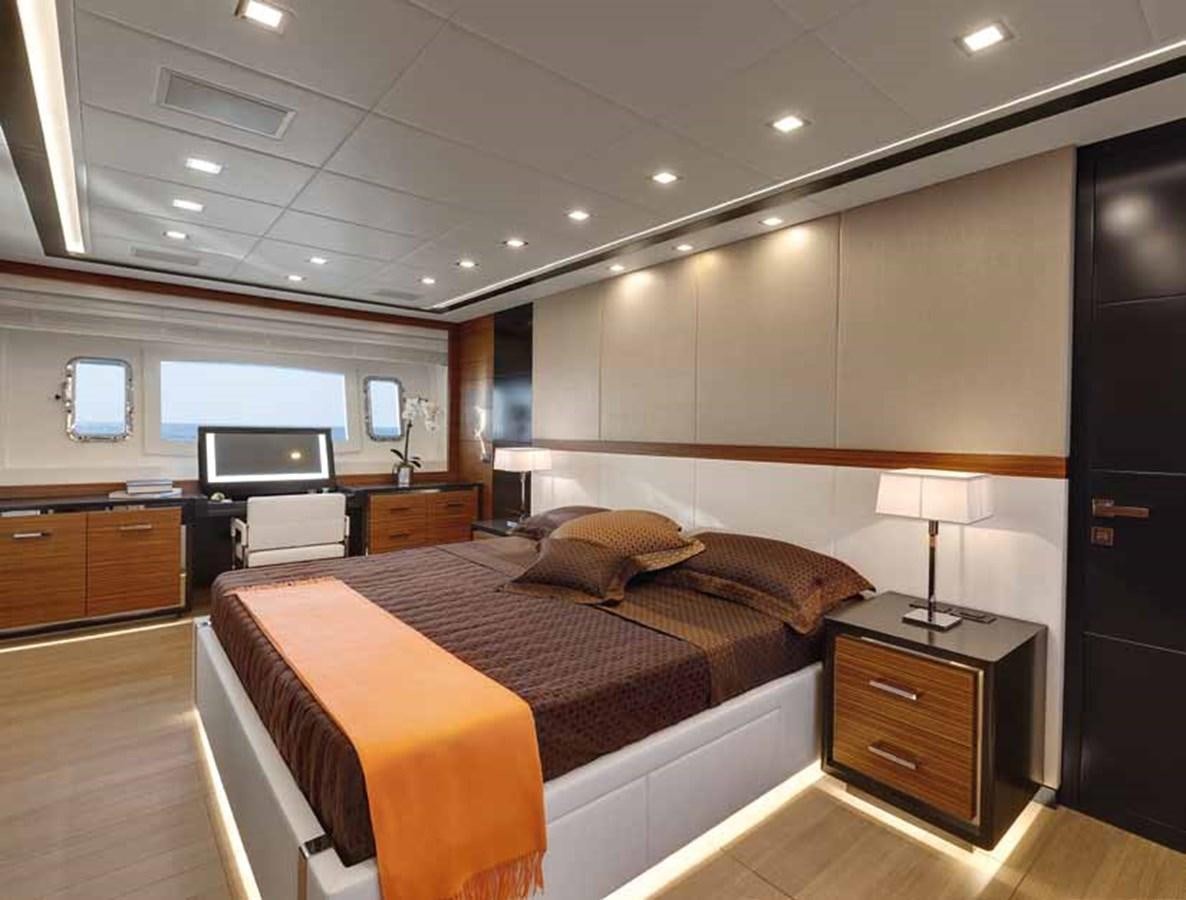 a bedroom with a large bed aboard AXTANA Yacht for Sale
