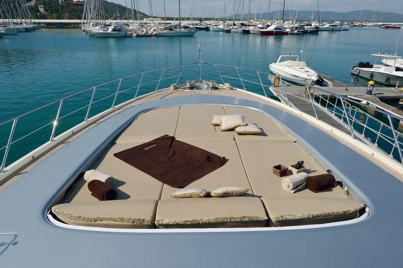 a boat on the water aboard MANGUSTA 108 - BECOOL - CAREFULLY USED Yacht for Sale