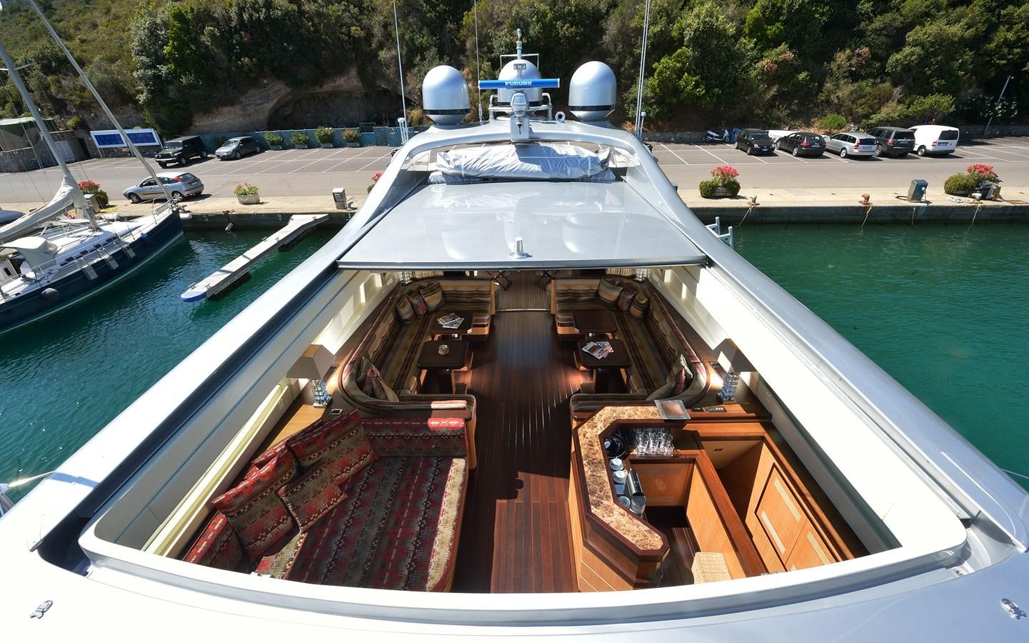 a boat on a dock aboard MANGUSTA 108 - BECOOL - CAREFULLY USED Yacht for Sale