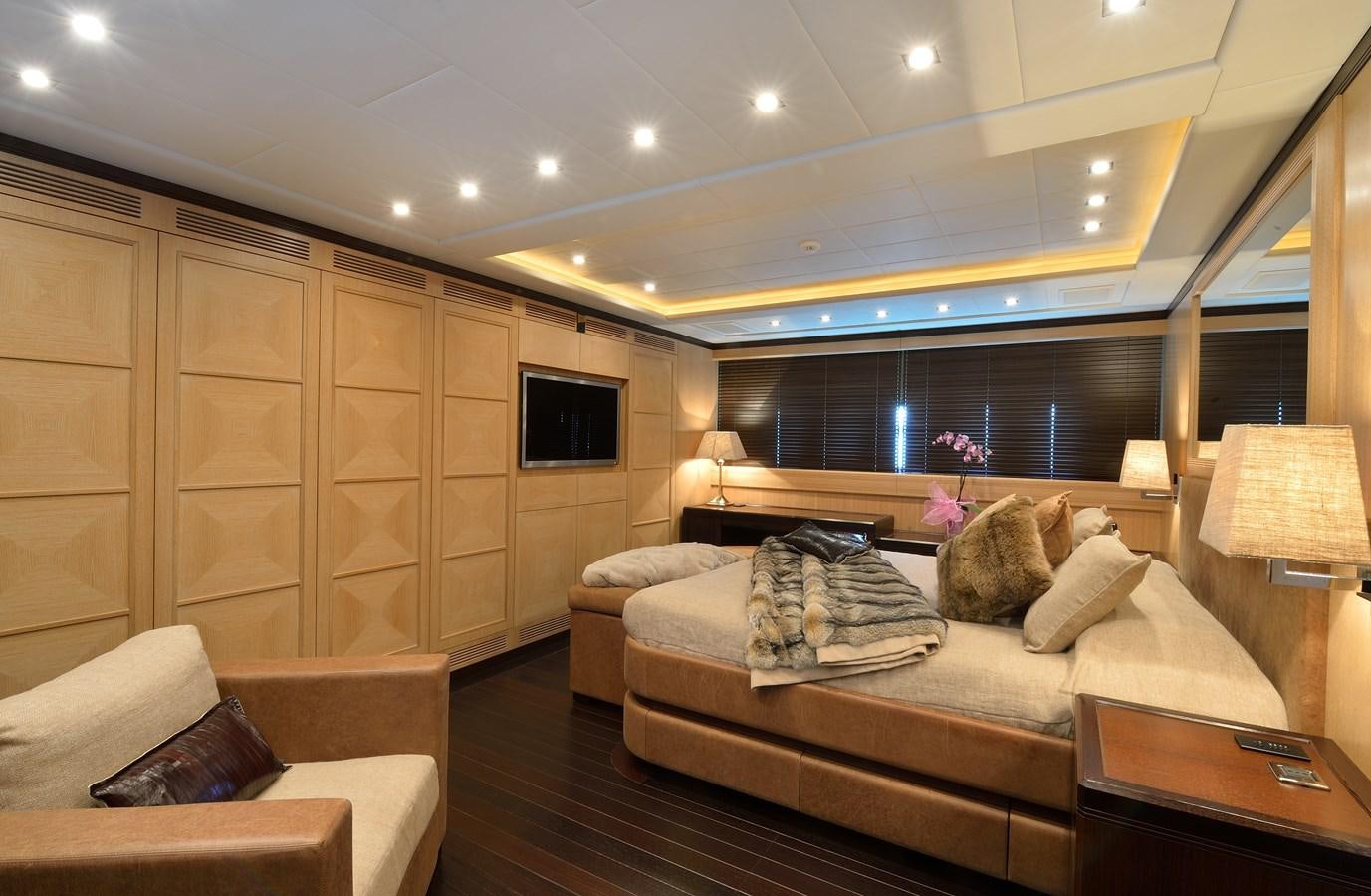 a large modern looking living room aboard MANGUSTA 108 - BECOOL - CAREFULLY USED Yacht for Sale