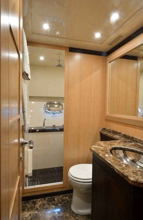 a bathroom with a sink toilet and a shower aboard MANGUSTA 108 - BECOOL - CAREFULLY USED Yacht for Sale
