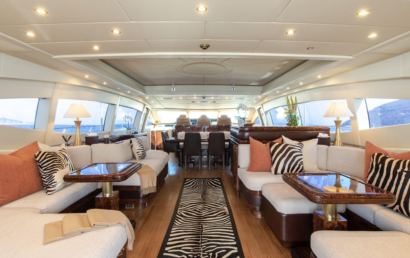 a living room with a large window aboard FATAMORGANA Yacht for Sale