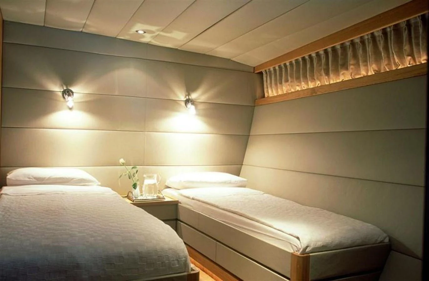 a room with two beds aboard ALLAHOU Yacht for Sale