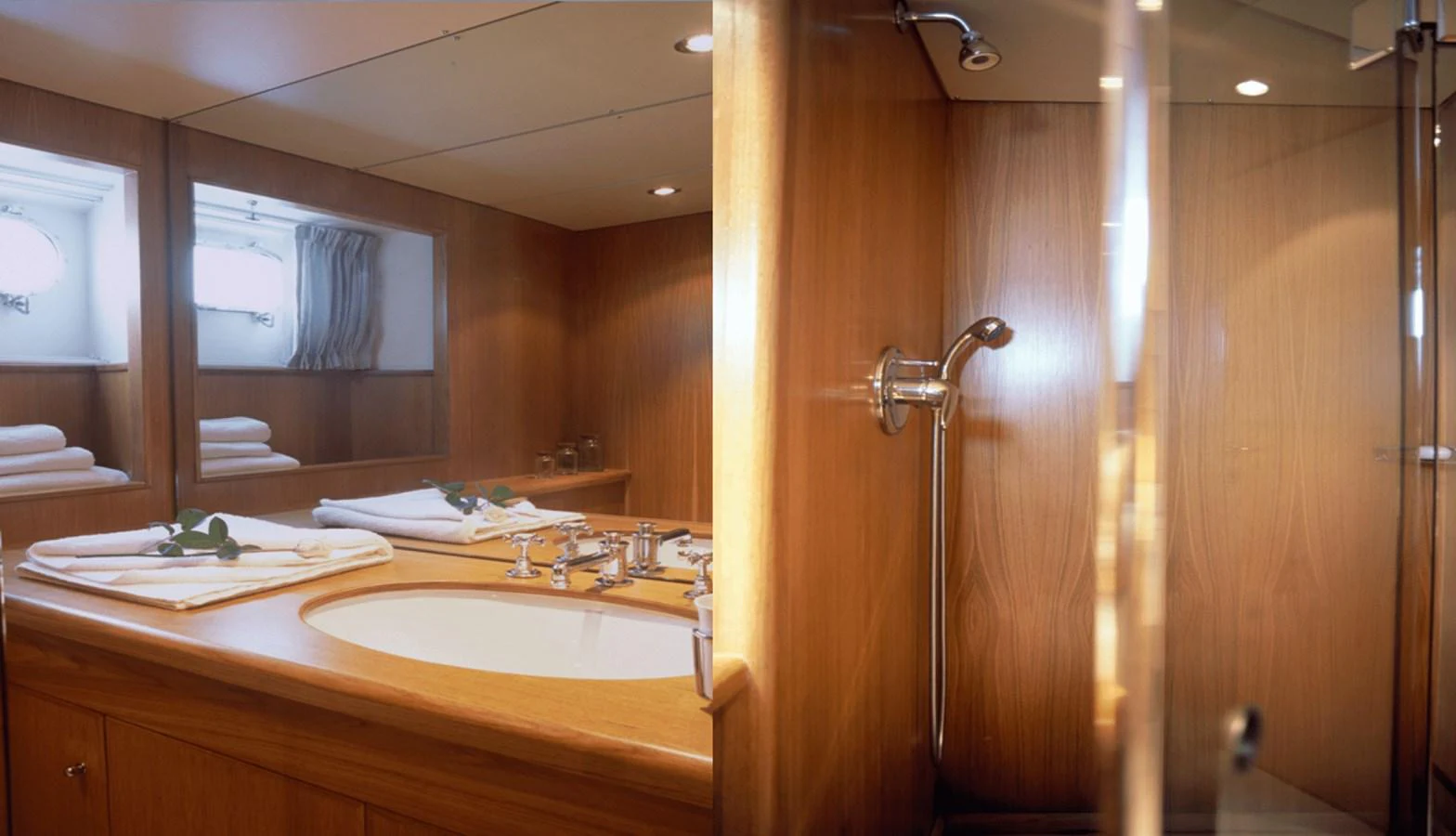 a bathroom with a sink and a mirror aboard ALLAHOU Yacht for Sale