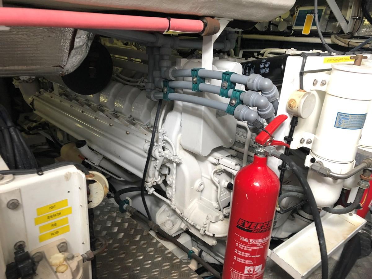 a close-up of a car engine aboard UNICO Yacht for Sale