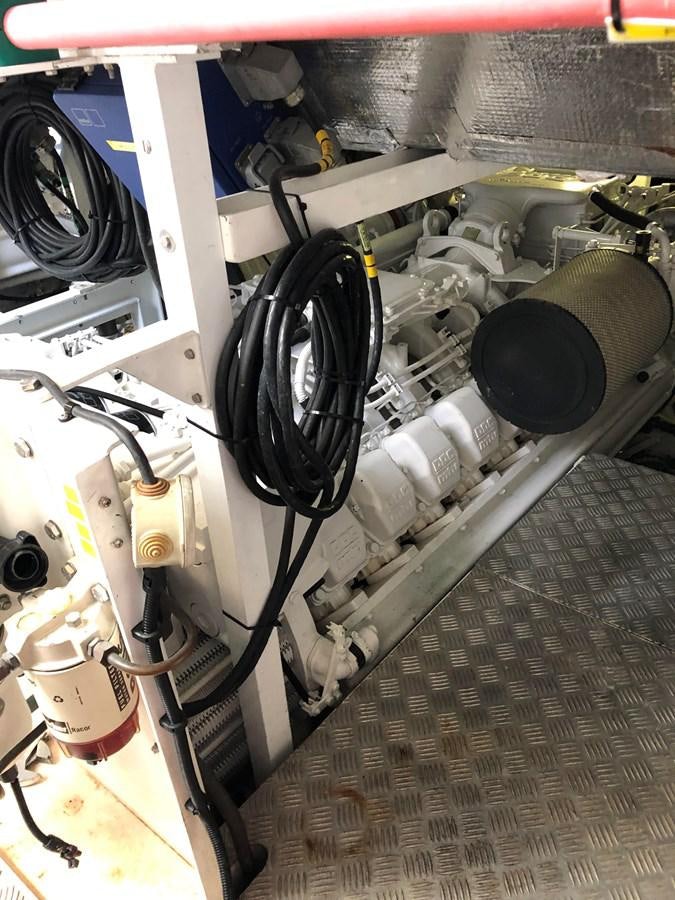a close-up of a car engine aboard UNICO Yacht for Sale