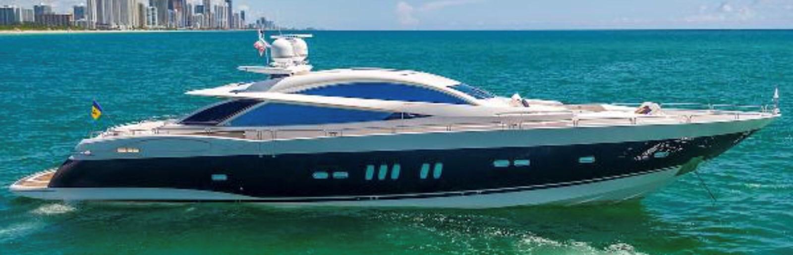 a black and white boat on the water aboard UNICO Yacht for Sale