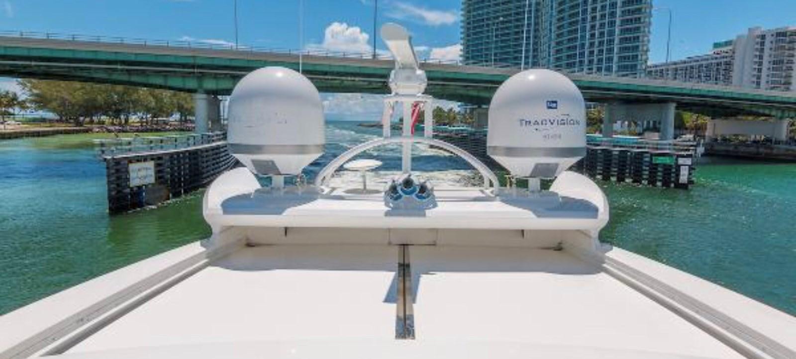 a white satellite dish on a dock aboard UNICO Yacht for Sale