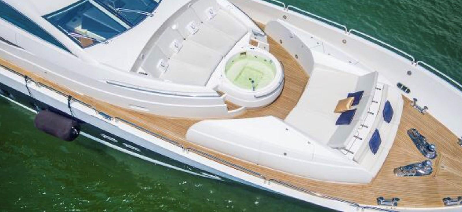 a large white boat aboard UNICO Yacht for Sale