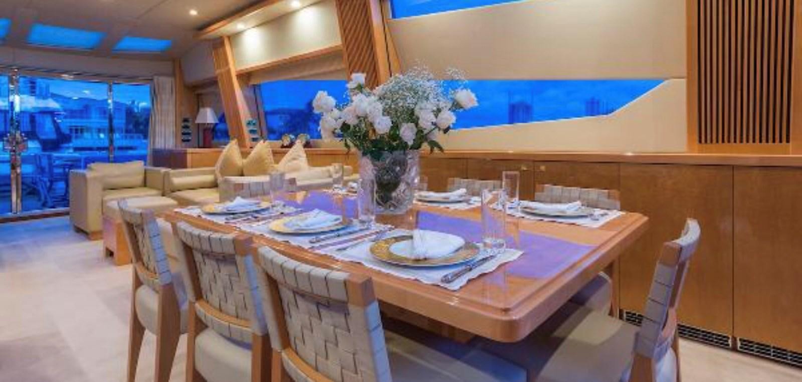 a table set for a dinner aboard UNICO Yacht for Sale