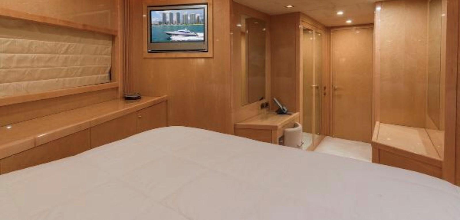 a bed in a room aboard UNICO Yacht for Sale