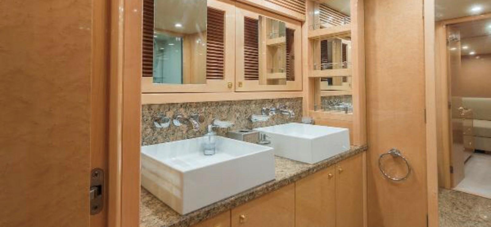 a bathroom with a large tub aboard UNICO Yacht for Sale