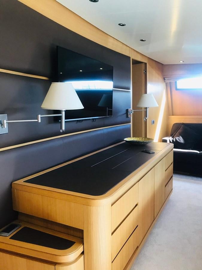 a tv on a wall aboard FIFTH AVENUE Yacht for Sale