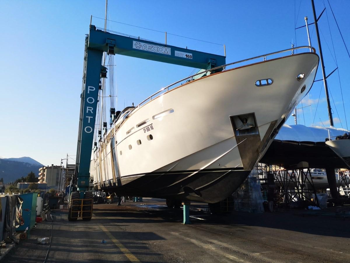 a large boat on a dock aboard FIFTH AVENUE Yacht for Sale