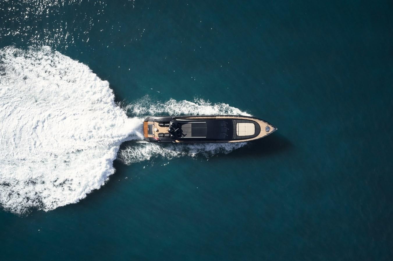 a boat in the water aboard MANGUSTA 108 Yacht for Sale