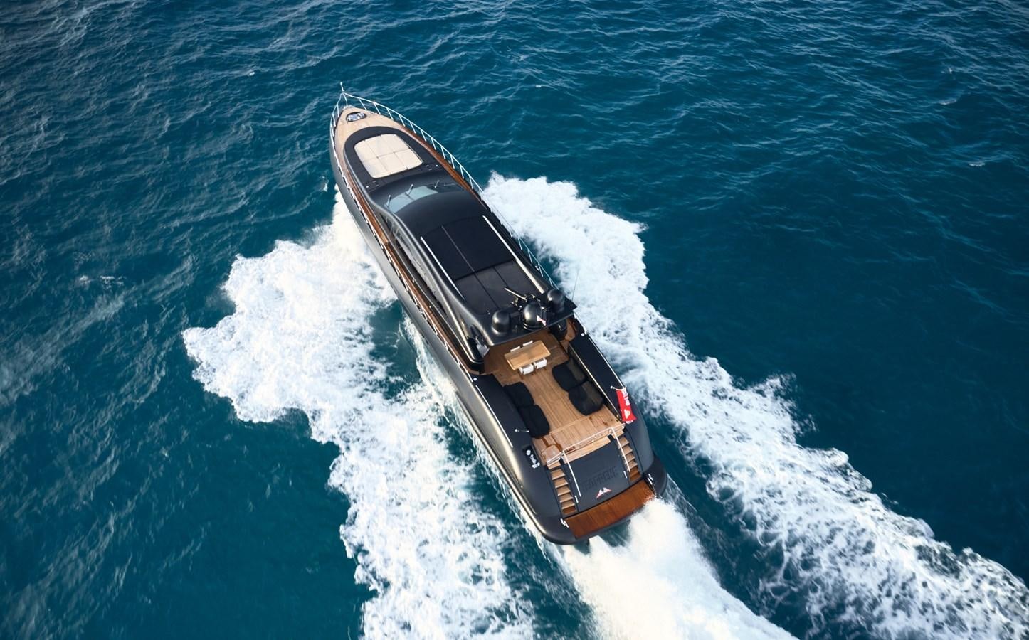 a ship on the water aboard MANGUSTA 108 Yacht for Sale