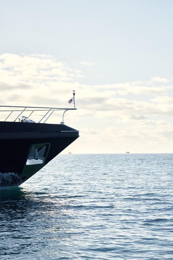 a boat in the water aboard MANGUSTA 108 Yacht for Sale