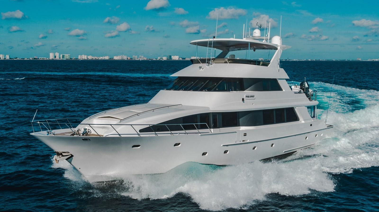 a white yacht on the water aboard FREE SPIRIT Yacht for Sale