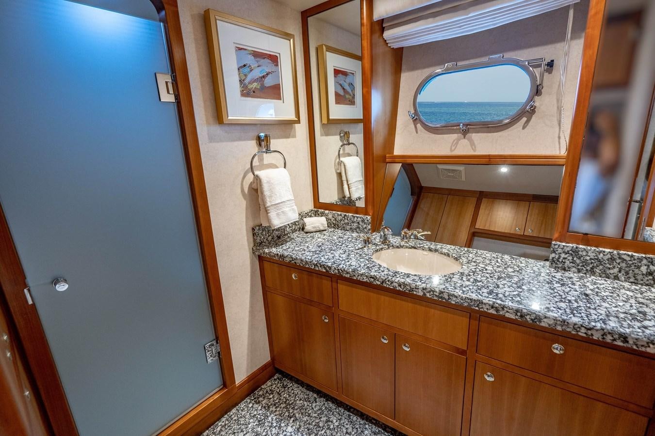 a bathroom with a marble counter top aboard FREE SPIRIT Yacht for Sale