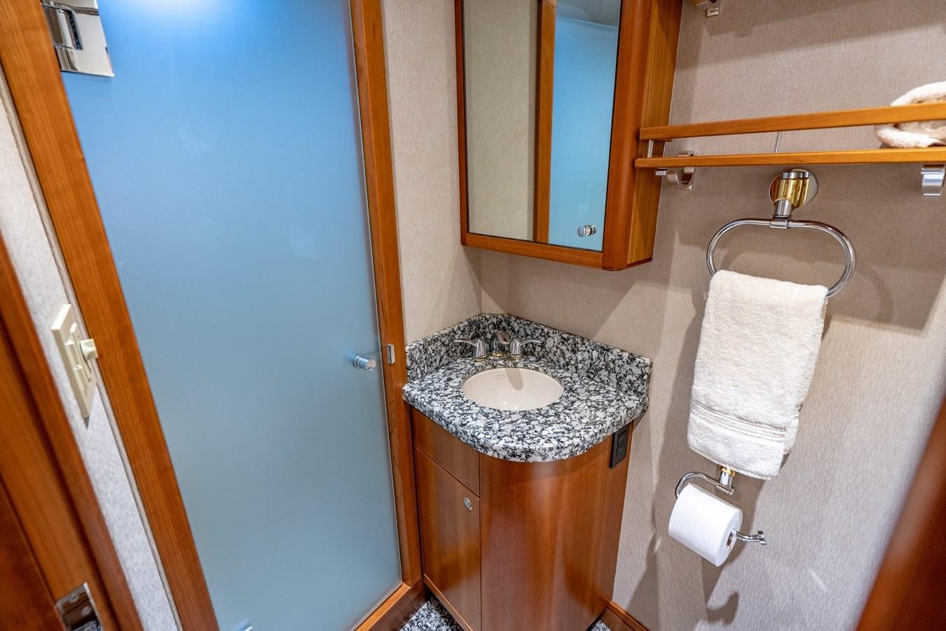 a bathroom with a sink and a mirror aboard FREE SPIRIT Yacht for Sale