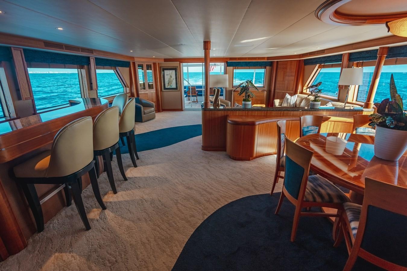 a large kitchen with a bar and bar aboard FREE SPIRIT Yacht for Sale