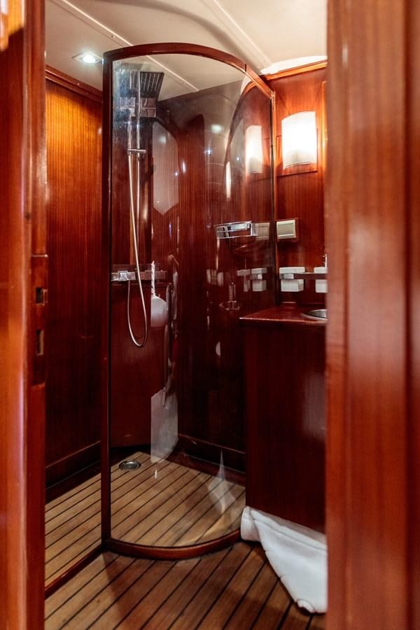 a bathroom with a large mirror aboard VITA DOLCE Yacht for Sale