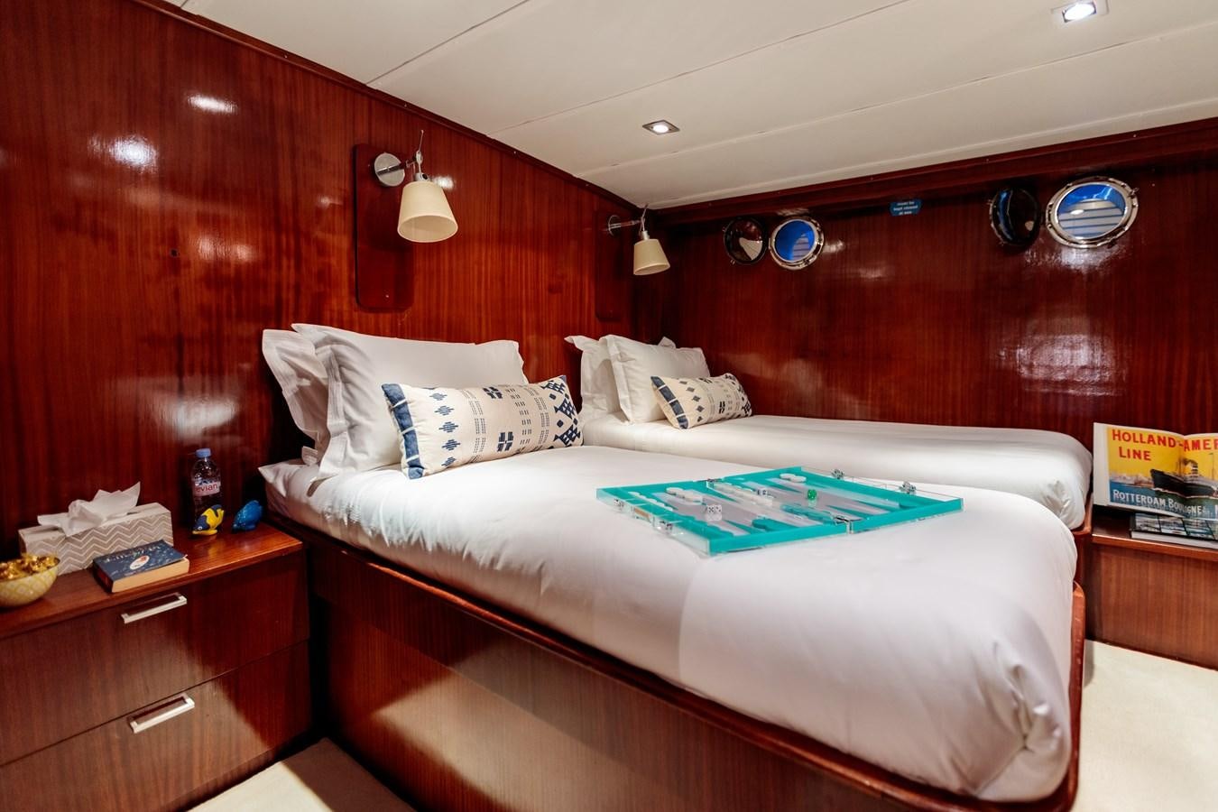 a bed with a pool table aboard VITA DOLCE Yacht for Sale