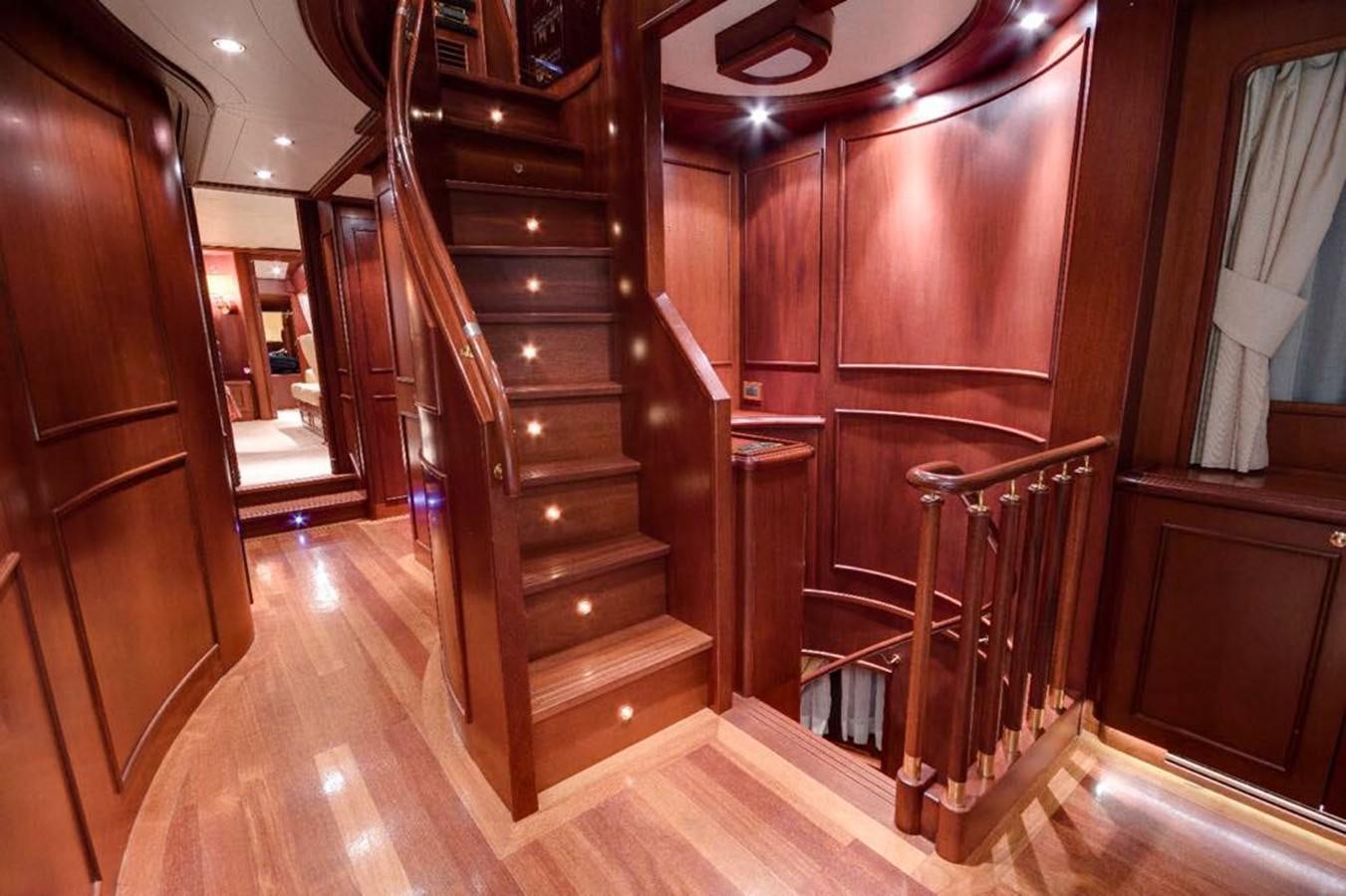 a wooden cabinet in a room aboard GIHRAMAR Yacht for Sale