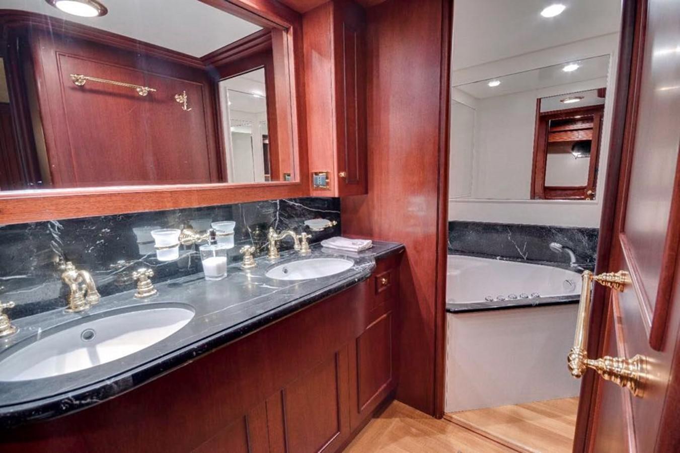 a bathroom with a large countertop aboard GIHRAMAR Yacht for Sale