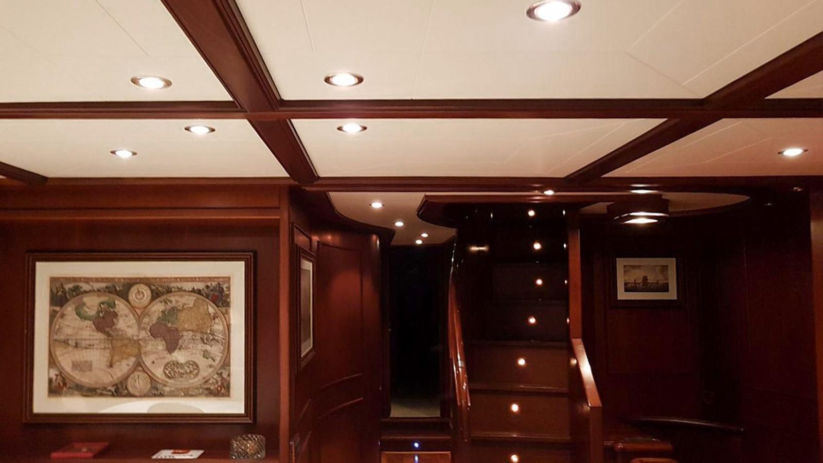 a room with a painting on the wall aboard GIHRAMAR Yacht for Sale