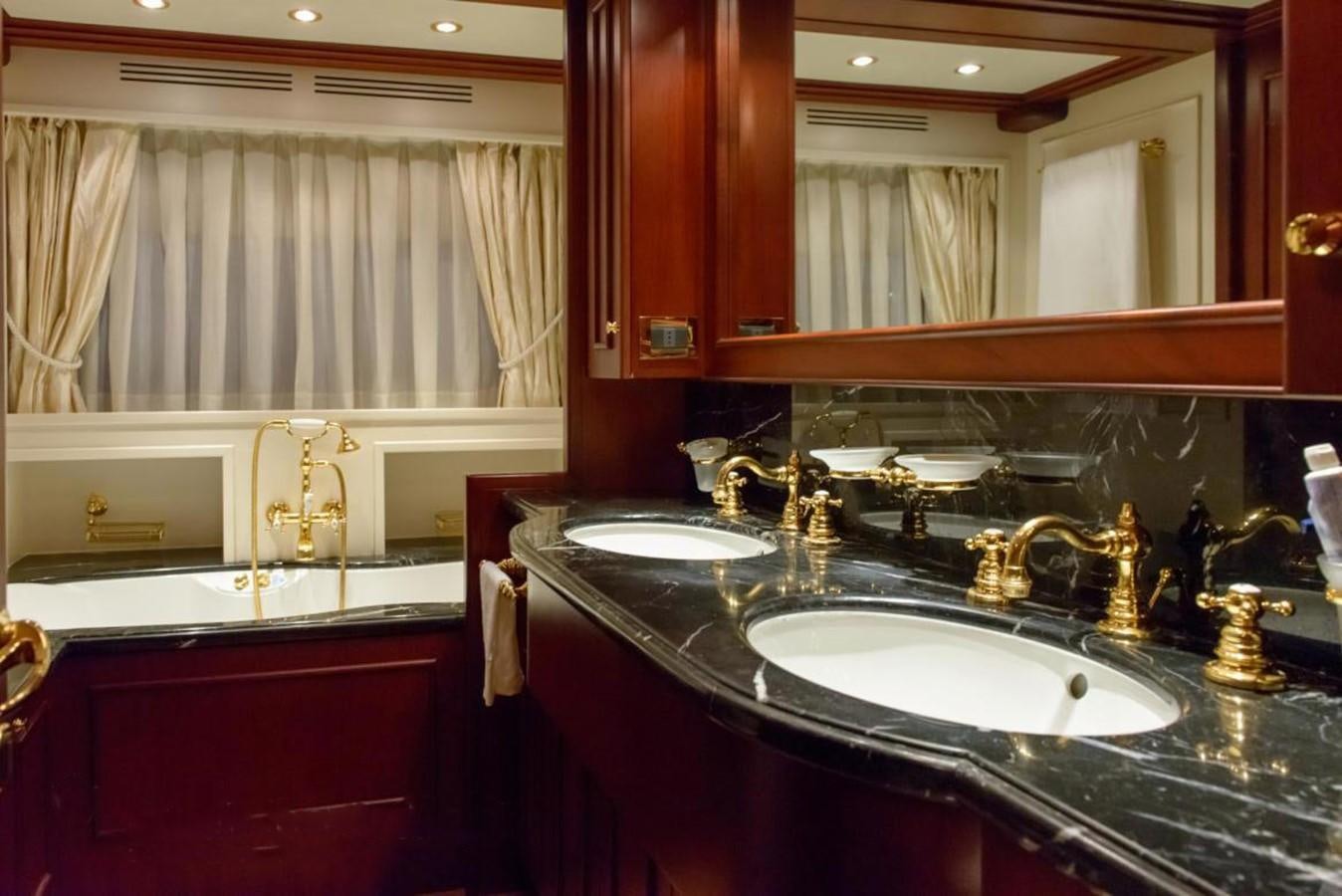 a bathroom with a double sink aboard GIHRAMAR Yacht for Sale