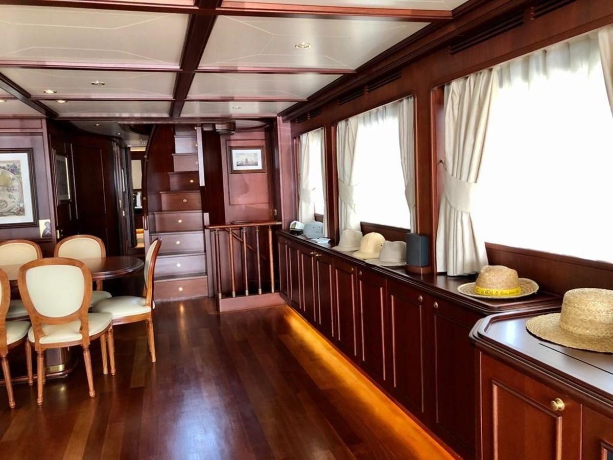 a kitchen with a wood floor aboard GIHRAMAR Yacht for Sale