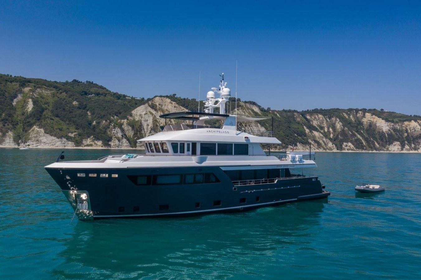 a boat in the water aboard DARWIN CLASS 102 Yacht for Sale
