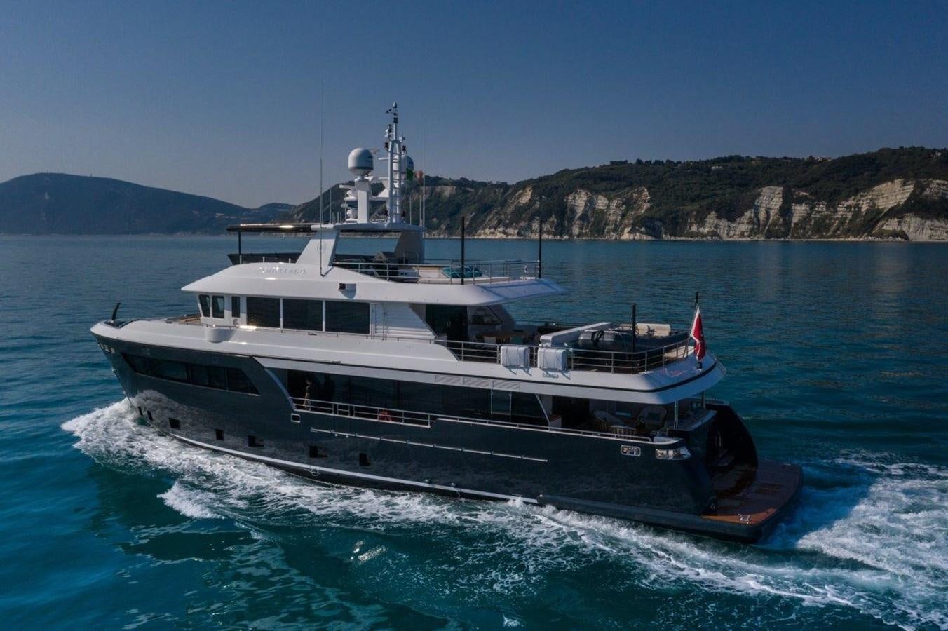 a boat on the water aboard DARWIN CLASS 102 Yacht for Sale