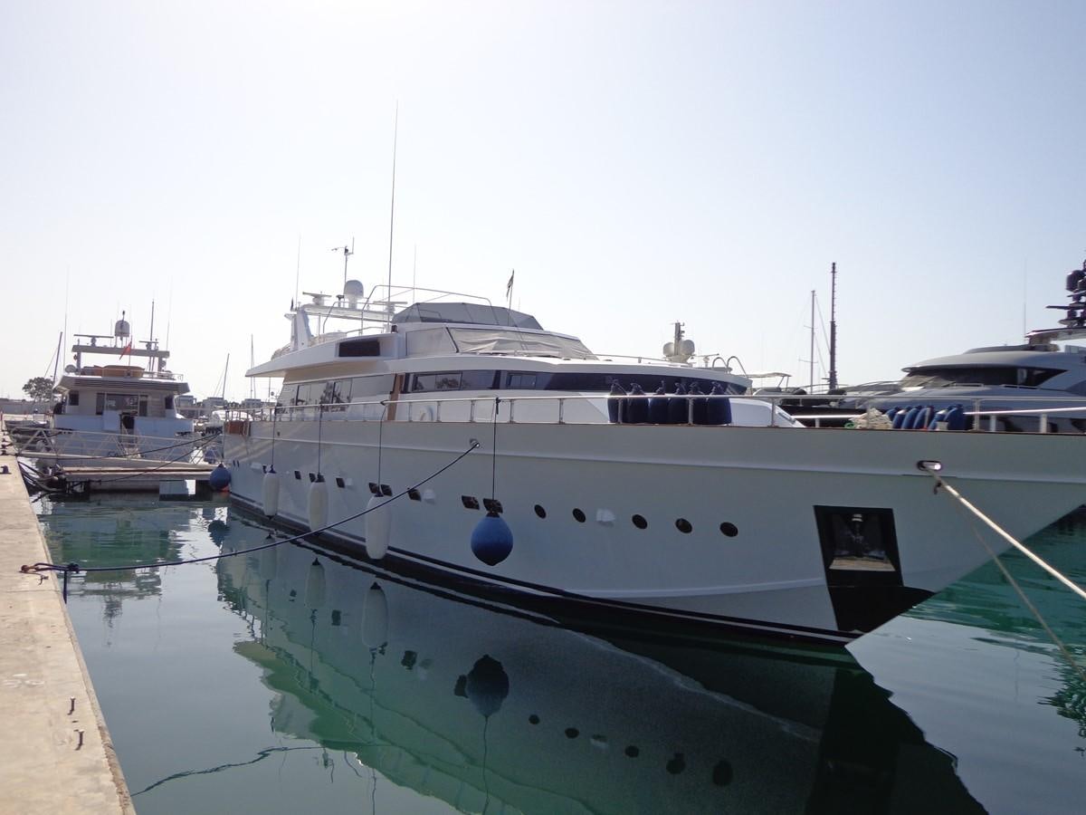 a group of boats docked with USS Potomac (AG-25) in the background aboard AKHIR 31 Yacht for Sale