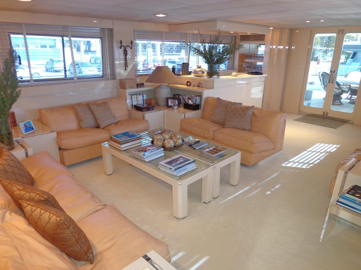 a living room with a coffee table and a couch aboard AKHIR 31 Yacht for Sale