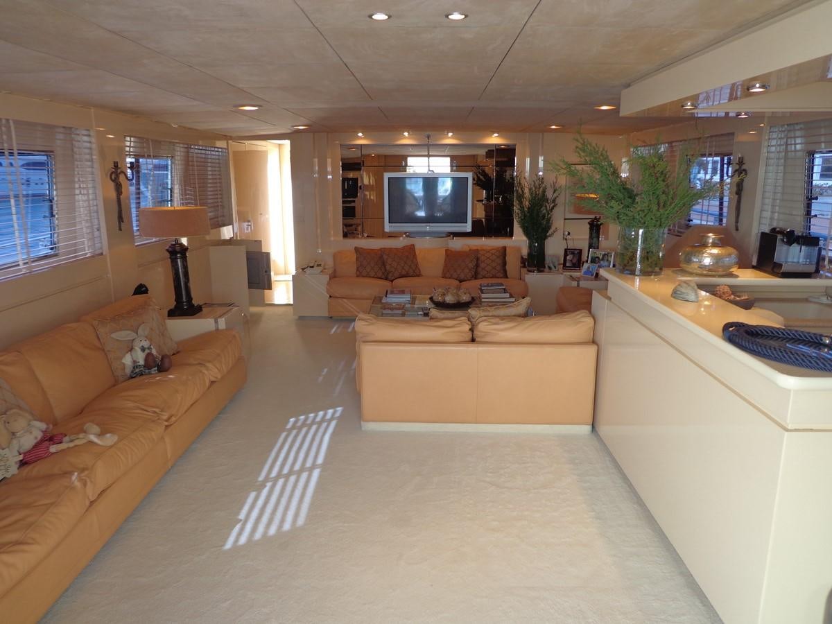 a living room with a large screen aboard AKHIR 31 Yacht for Sale