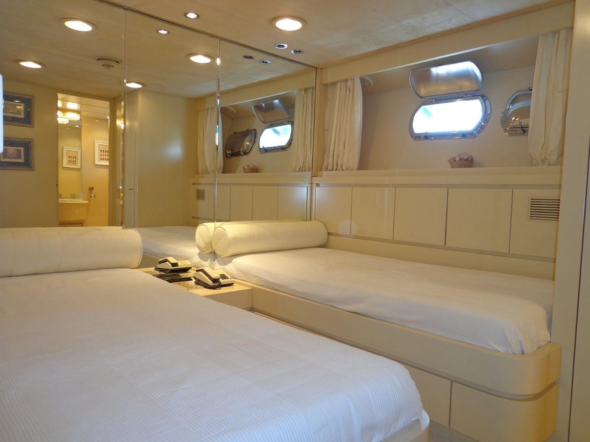 a room with two beds aboard AKHIR 31 Yacht for Sale
