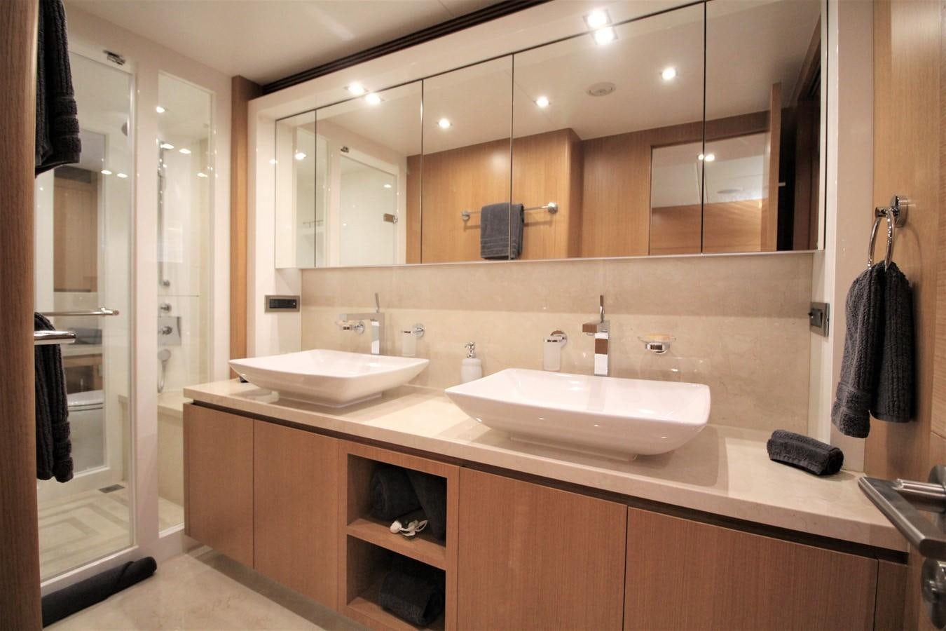 a bathroom with a large mirror aboard EUPHORIA Yacht for Sale