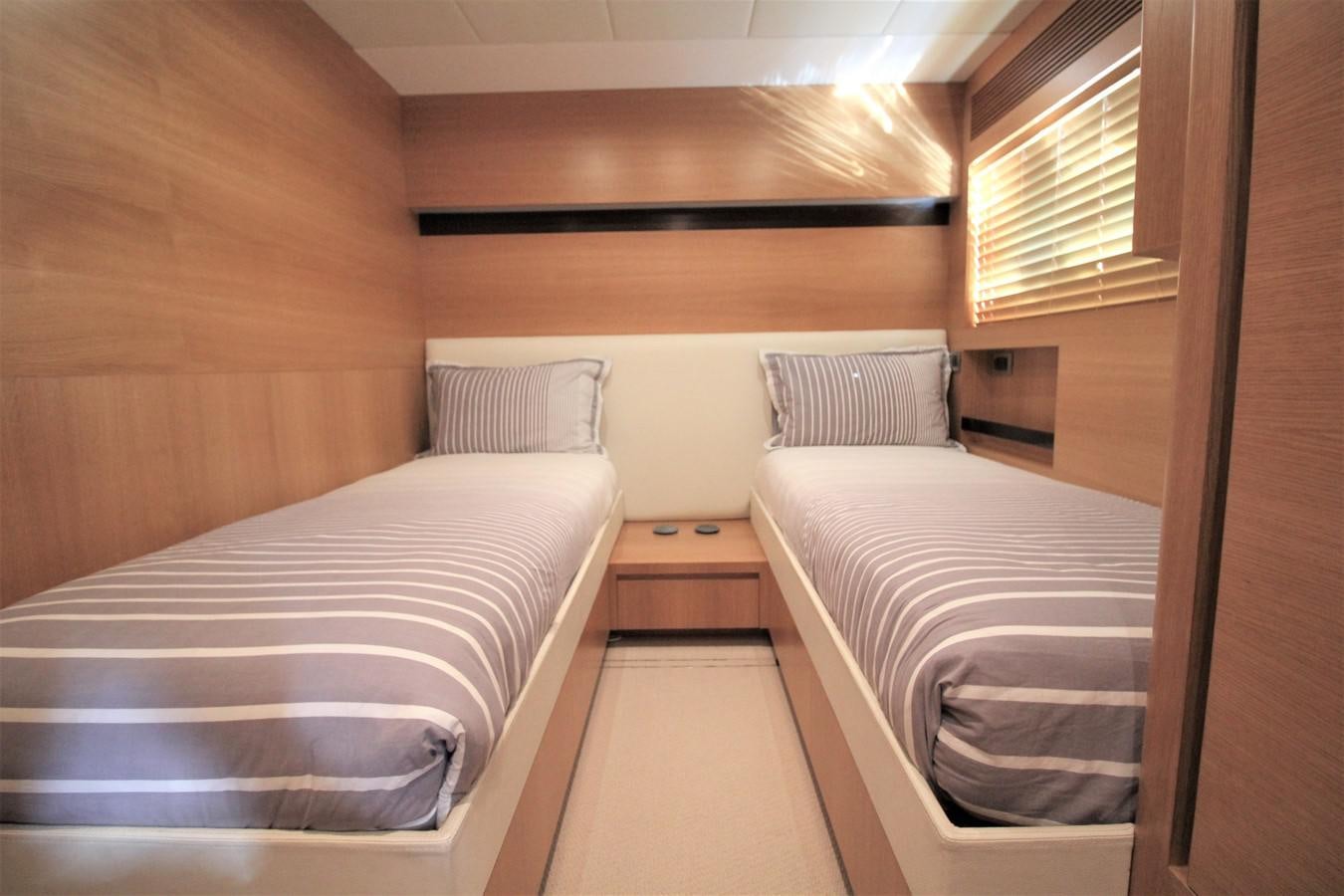 a room with bunk beds aboard EUPHORIA Yacht for Sale