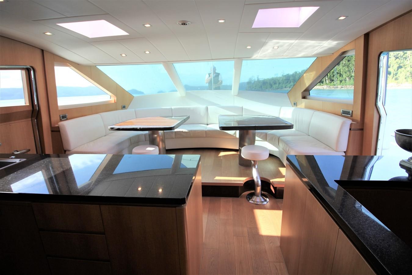 a room with a table and chairs aboard EUPHORIA Yacht for Sale