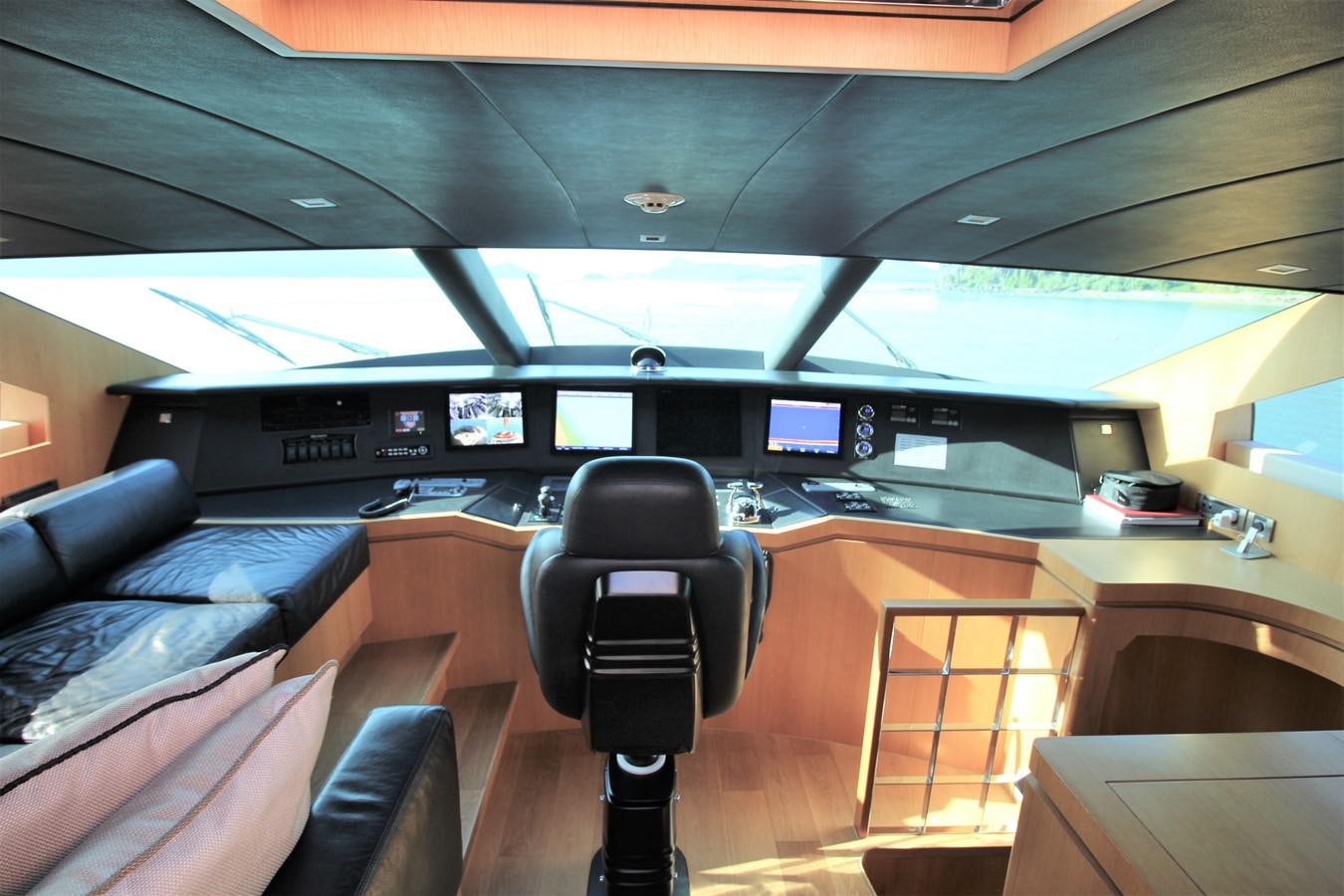 a black chair in a room aboard EUPHORIA Yacht for Sale